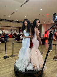 Elegant white dresses at 360 photo booth